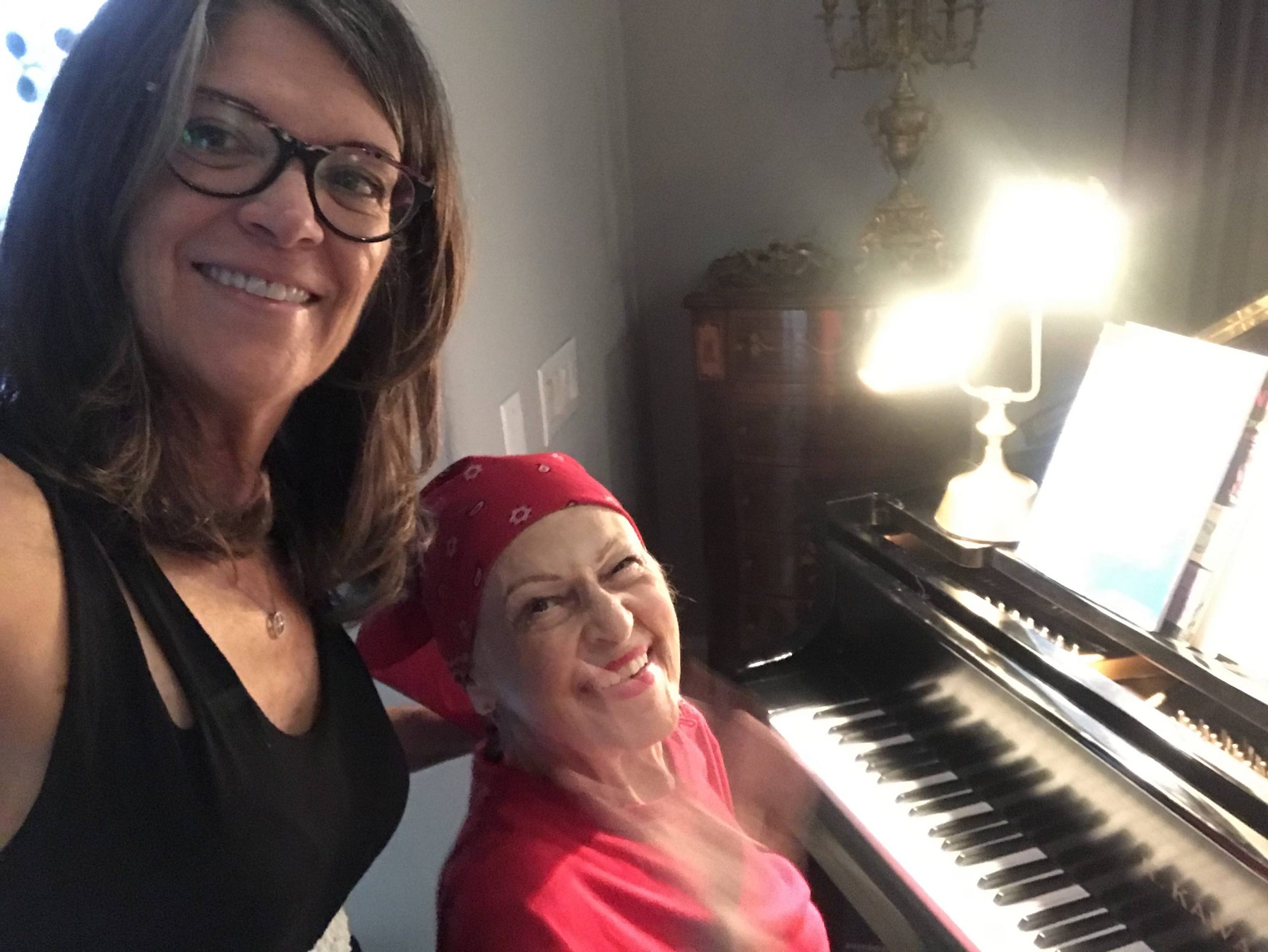 Katherine and Mary Carol at the piano